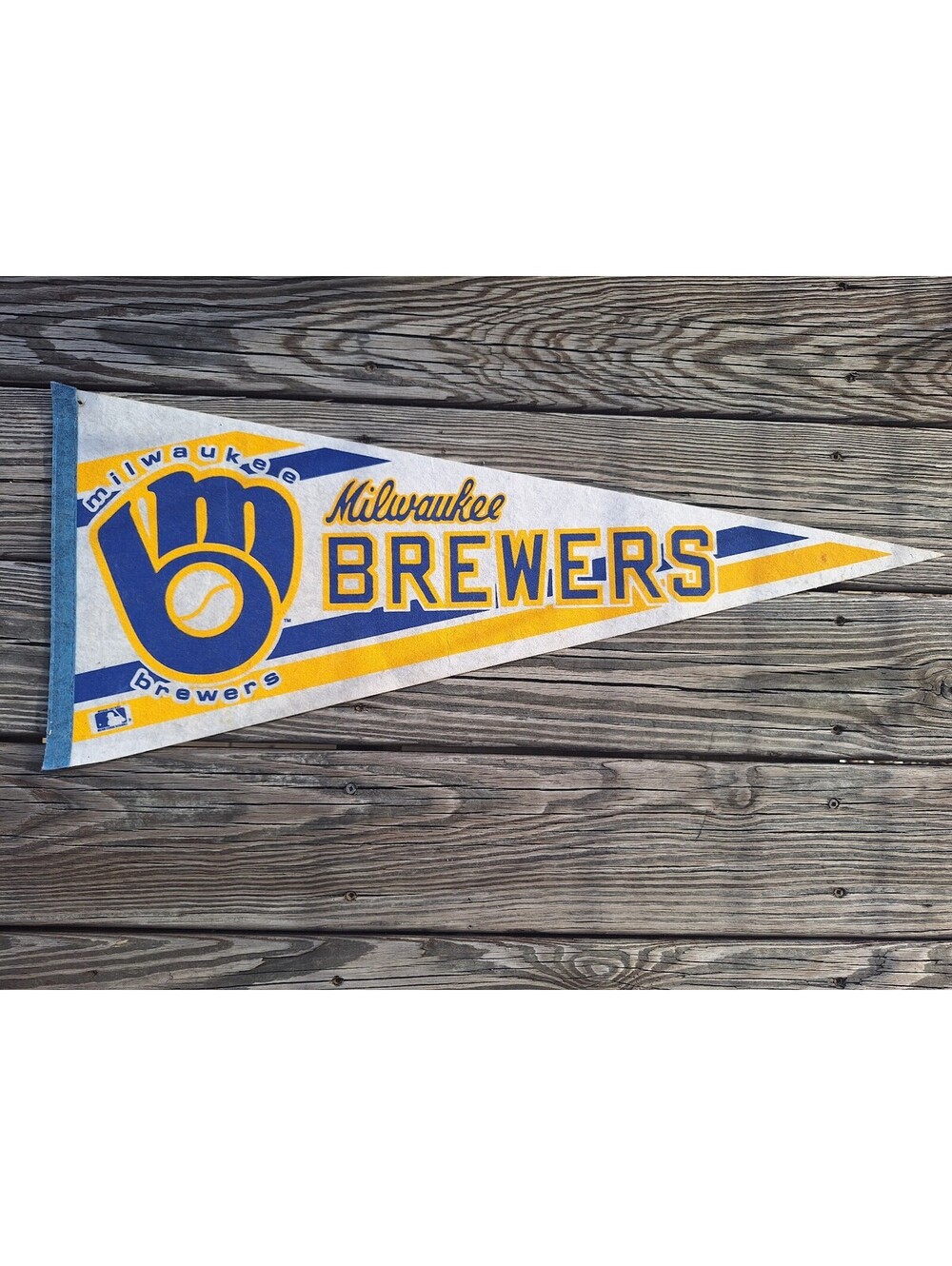 vintage Milwaukee Brewers felt baseball pennant featuring  "m-glove" logo